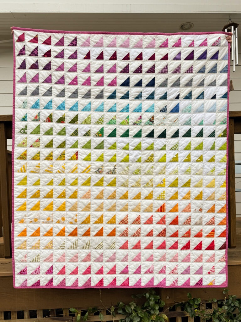 Handmade Rainbow Half Square Triangle Quilt with Pink Border