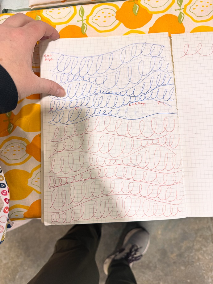 Quilting Loop Practice on Graph Paper with Fabric Background